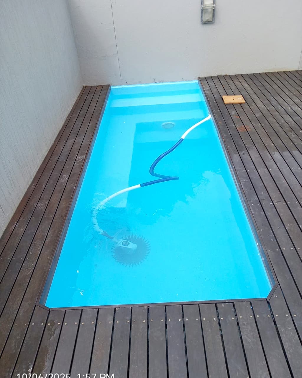 The same pool resurfaced in fresh blue marblite, ready to fill