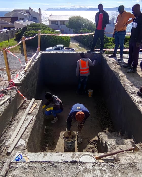 A pool build in progress, a new build, coastal site