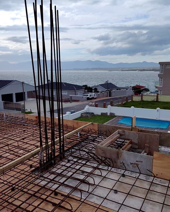 A pool build in progress, a new build, coastal site