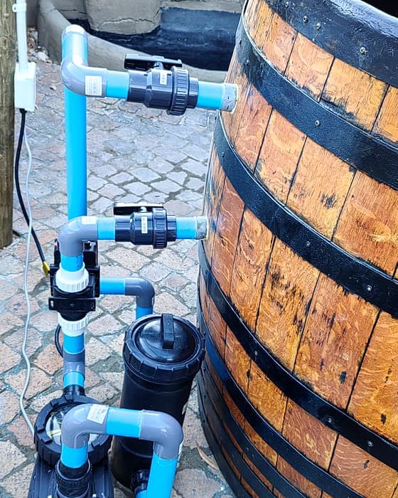 A pool build in progress, a barrel plunge tub build
